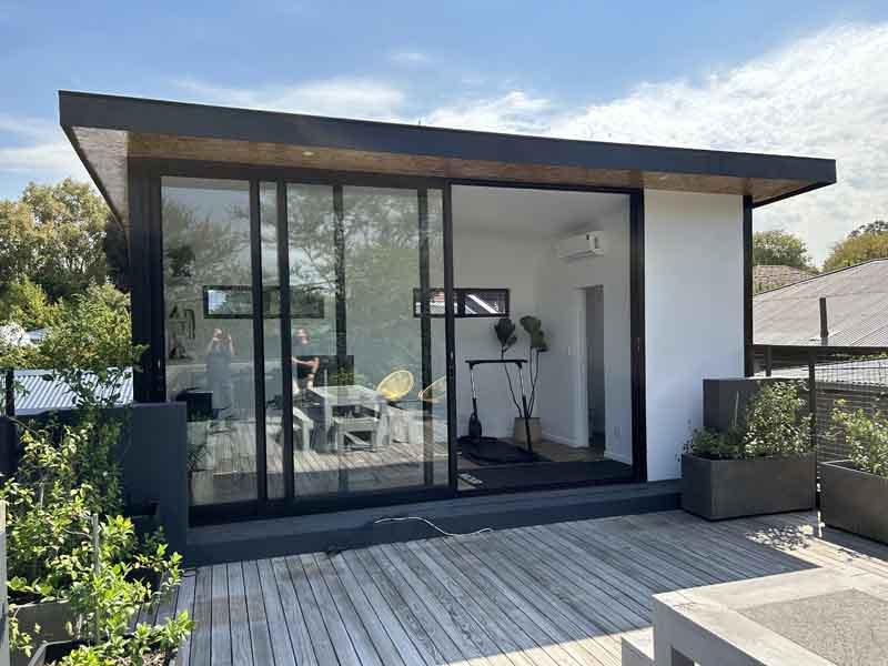 Small xPod studio with glazing on a timber deck